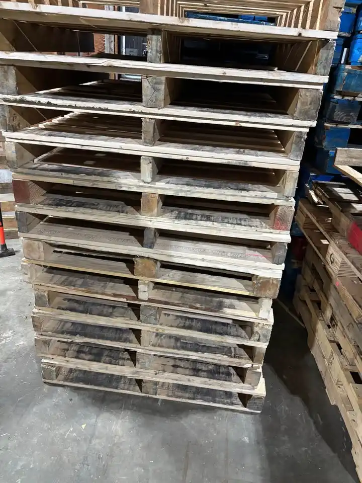 Stack of inspected used wooden pallets for sale in Edmonton