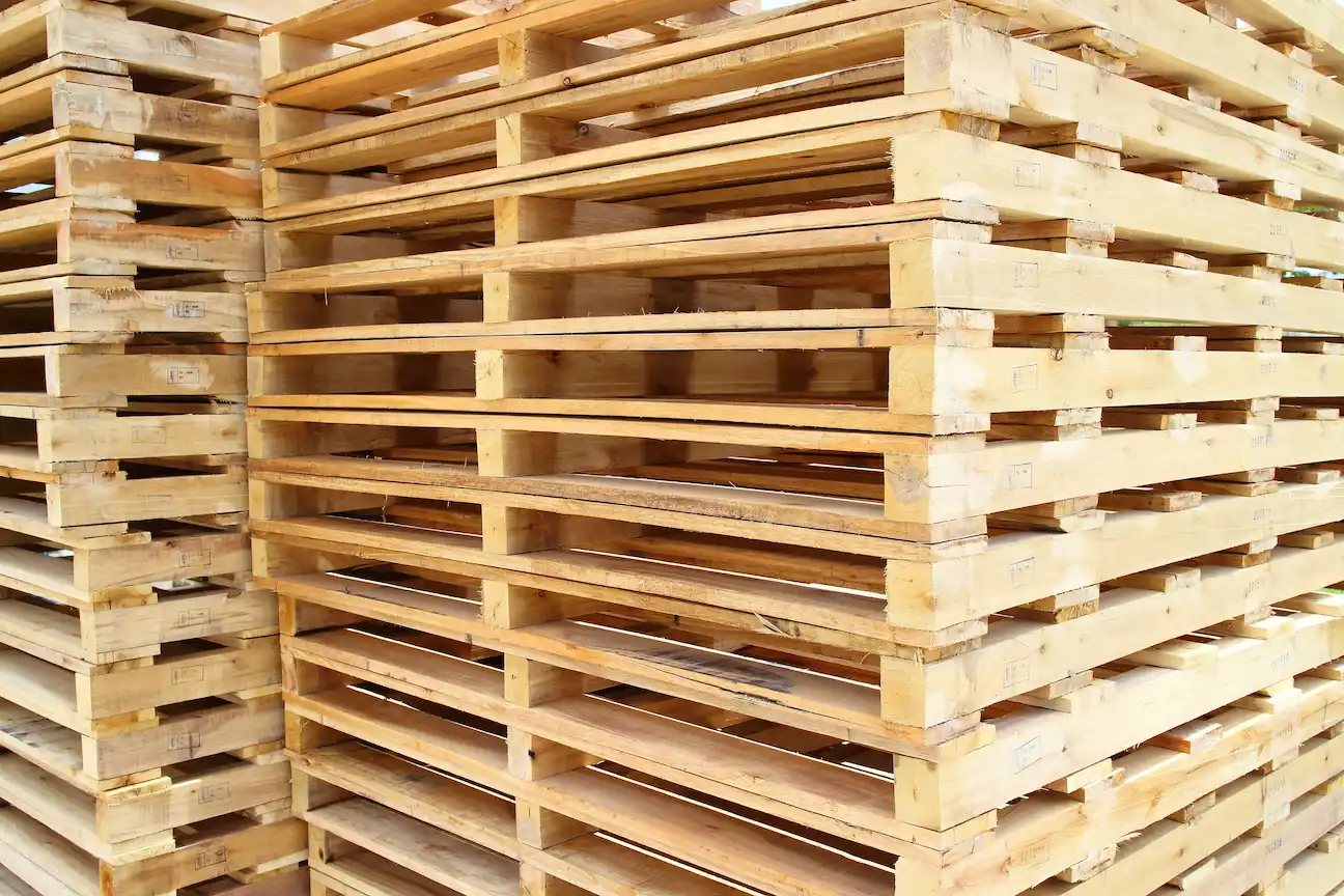 Edmonton warehouse stacking second hand wooden pallets for sale